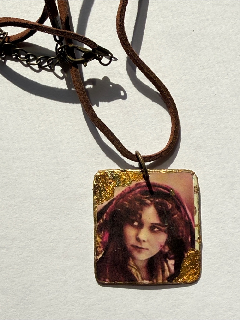 Vintage-Inspired Brown Leather Choker Necklace with Pink Portrait Pendant